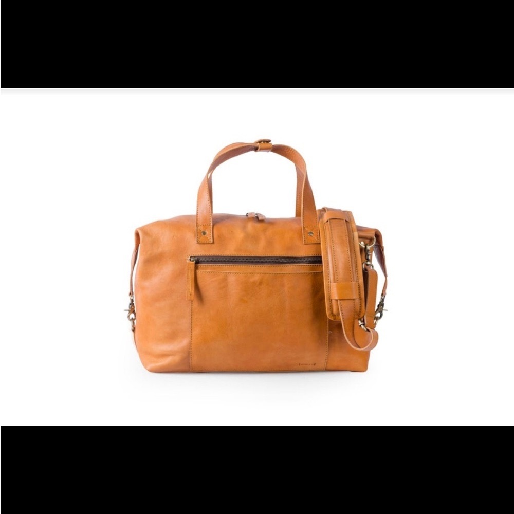 Light brown /Tan/ Leather travel Duffle or Day Bag (camera not incl).